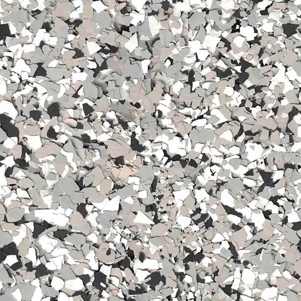 The image features a close-up of a textured surface with a pattern of scattered gray and white flakes, resembling terrazzo flooring.