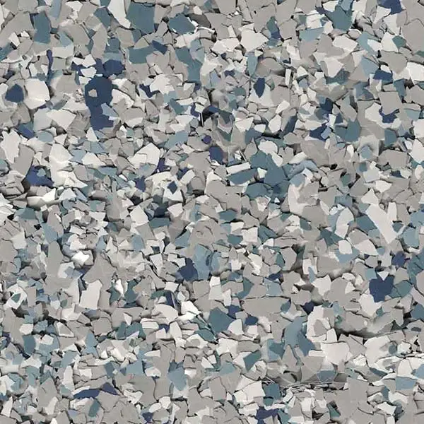 This image depicts a textured surface of scattered gray and blue flakes, resembling terrazzo or a similar flooring material for decorative purposes.