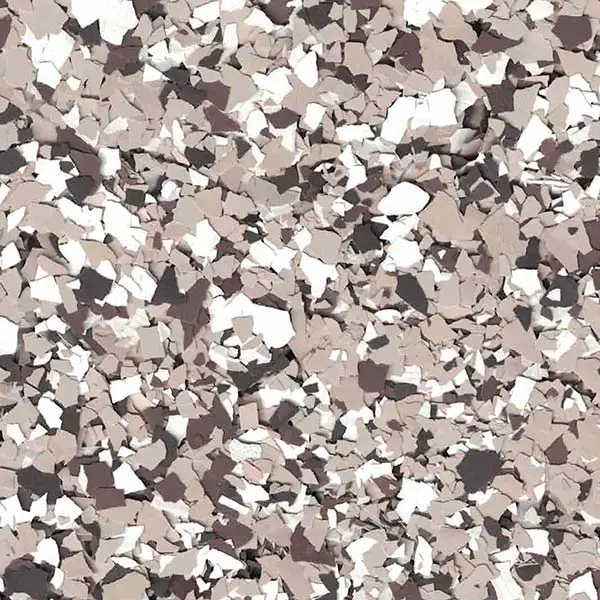 This image shows a textured surface with a pattern of scattered, irregular flakes in shades of beige, white, and brown.