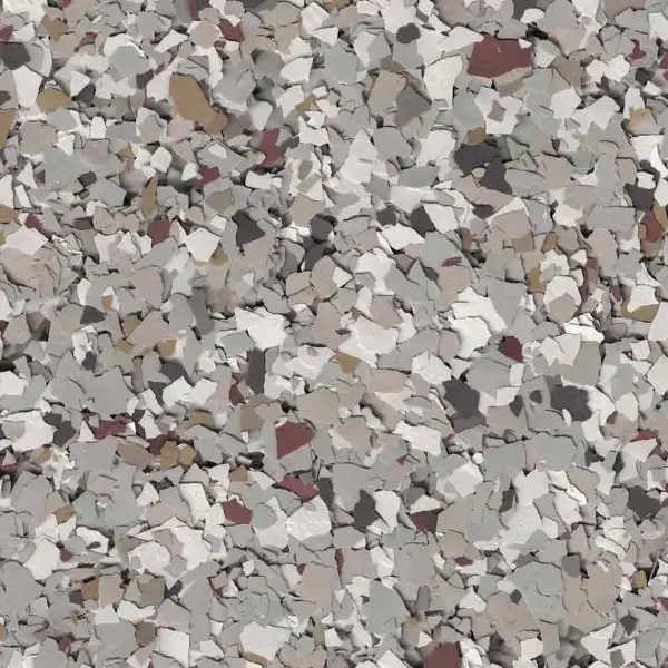 Abstract pattern composed of variously sized and colored flakes, predominantly in shades of gray, white, and brown, creating a textured surface appearance.