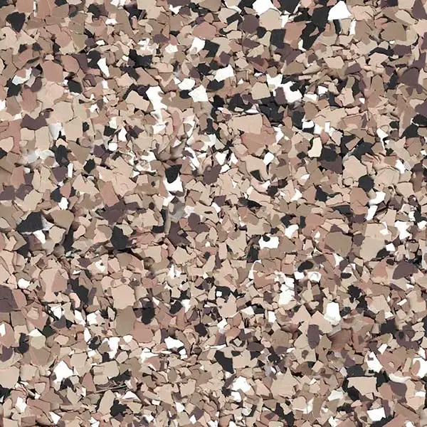 The image features a close-up view of a surface covered with small, irregularly shaped fragments in beige, brown, black, and white colors.