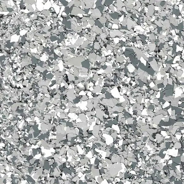 A grayscale abstract pattern with scattered, irregular shapes resembling torn paper pieces. No landmarks or people are visible in the image.