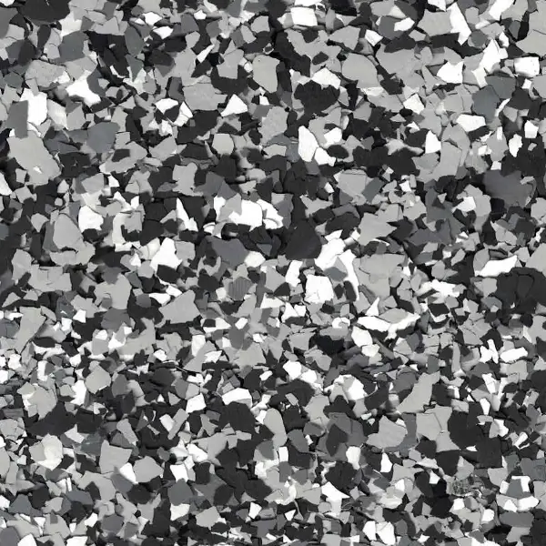 Abstract pattern with irregular black, white, and gray pieces scattered randomly. No identifiable landmarks or objects present. Appears textural and visually dynamic.